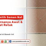 Keramik kecil berwarna-warni dengan nat retak dan pudar di beberapa bagian, menggambarkan pentingnya memilih semen nat yang tepat.